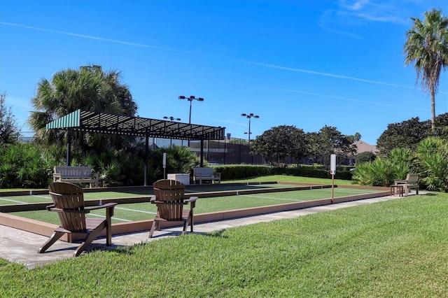 8755 Olde Hickory Ave Unit 7105, Sarasota, FL 34238 - view of home's community featuring a bocce ball area and a lawn