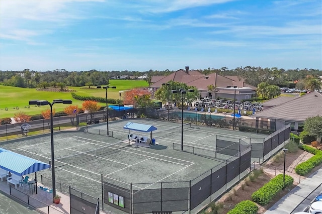 8755 Olde Hickory Ave Unit 7105, Sarasota, FL 34238 - view of tennis court with fence and golf course view