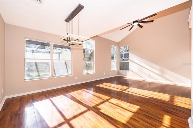1839 Cranberry Isles Way, Apopka, FL 32712 - unfurnished dining area with a chandelier, wood finished floors, baseboards, ceiling fan, and lofted ceiling