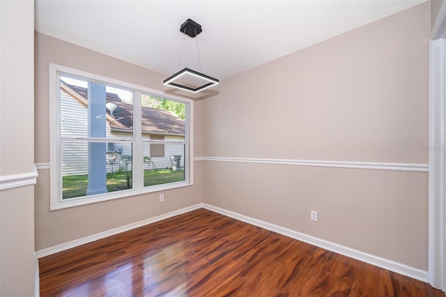 1839 Cranberry Isles Way, Apopka, FL 32712 - empty room with wood finished floors and baseboards