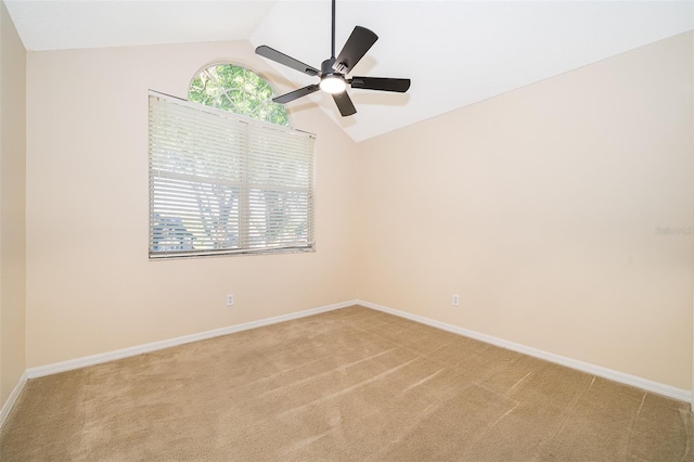1839 Cranberry Isles Way, Apopka, FL 32712 - spare room featuring light colored carpet, lofted ceiling, a ceiling fan, and baseboards
