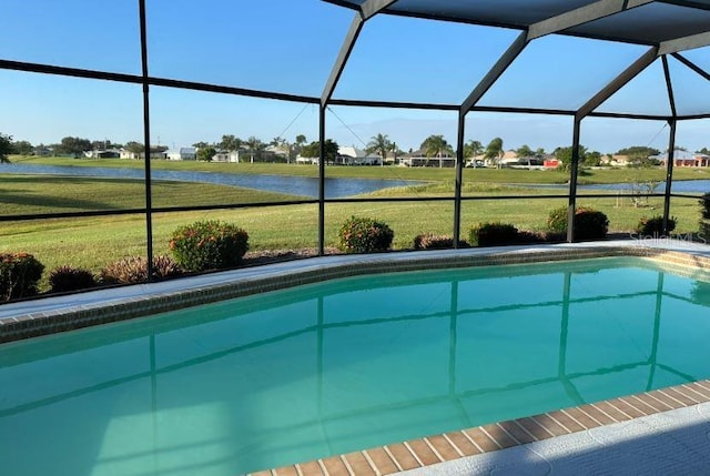 2178 Calcutta Rd, Punta Gorda, FL 33983 - outdoor pool featuring a water view, a yard, and glass enclosure