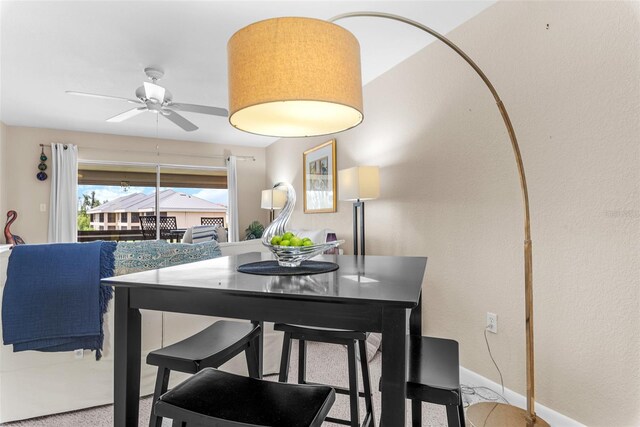 1355 Rock Dove Ct Unit 1-2, Punta Gorda, FL 33950 - dining room with ceiling fan, baseboards, and carpet floors