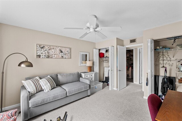 1355 Rock Dove Ct Unit 1-2, Punta Gorda, FL 33950 - living area featuring carpet floors, a ceiling fan, and baseboards