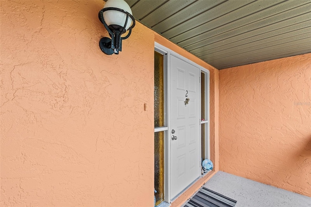 1355 Rock Dove Ct Unit 1-2, Punta Gorda, FL 33950 - entrance to property with stucco siding