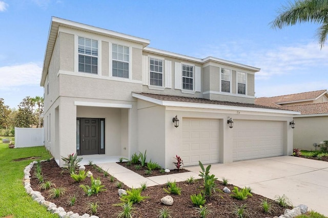 4429 67th St E, Bradenton, FL 34203 - multi unit property featuring stucco siding, a garage, and driveway