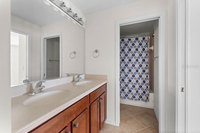 4429 67th St E, Bradenton, FL 34203 - full bathroom with double vanity, tile patterned floors, and shower / bath combo with shower curtain