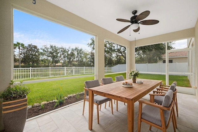4429 67th St E, Bradenton, FL 34203 - sunroom / solarium featuring outdoor dining area, a ceiling fan, and plenty of natural light