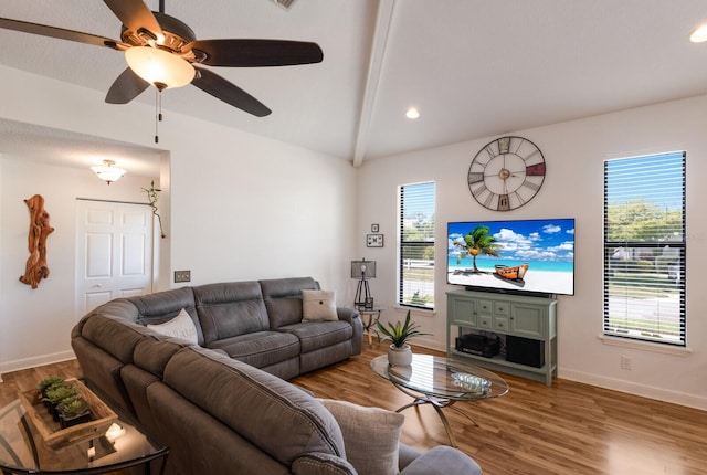 living room with wood finished floors, baseboards, a ceiling fan, and recessed lighting