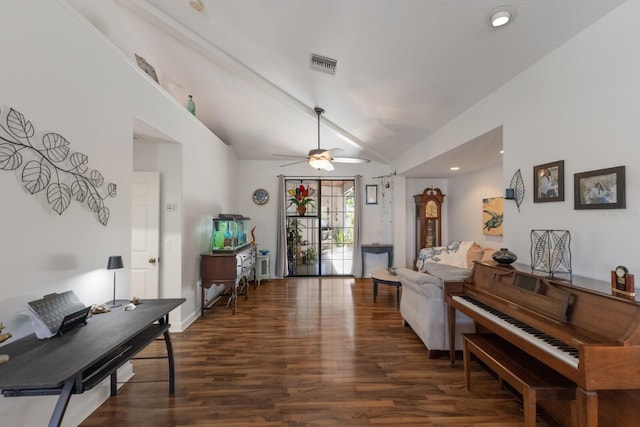 living area featuring a ceiling fan, wood finished floors, and lofted ceiling
