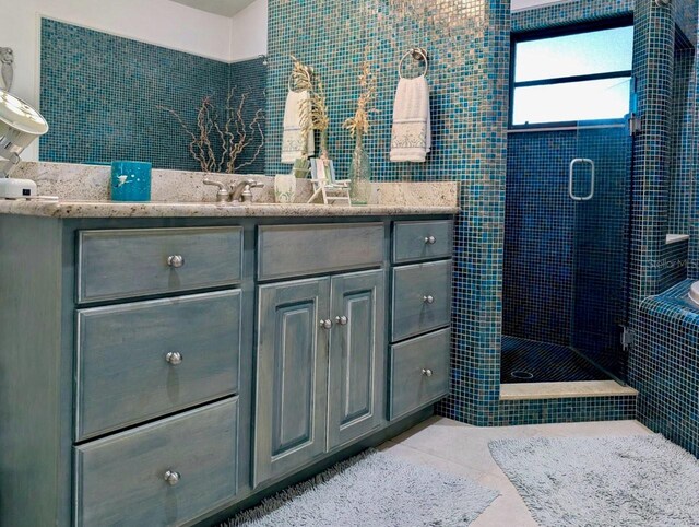 5403 2nd Ave W, Bradenton, FL 34209 - full bath featuring vanity, tile patterned floors, and a stall shower