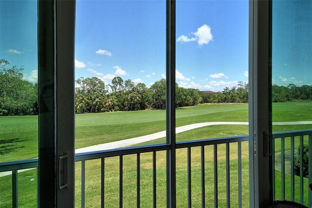 8735 Olde Hickory Ave Unit 8205, Sarasota, FL 34238 - view of grassy yard with view of golf course, view of scattered trees, and a balcony