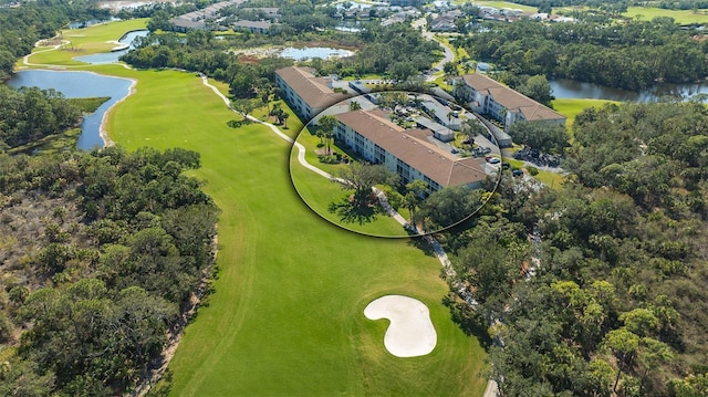 8735 Olde Hickory Ave Unit 8205, Sarasota, FL 34238 - drone / aerial view of a nearby body of water, a golf club, and a tree filled landscape