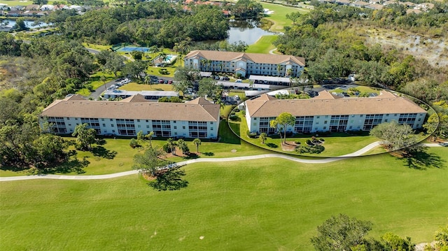 8735 Olde Hickory Ave Unit 8205, Sarasota, FL 34238 - drone / aerial view of a nearby body of water, apartment complex, and a golf club