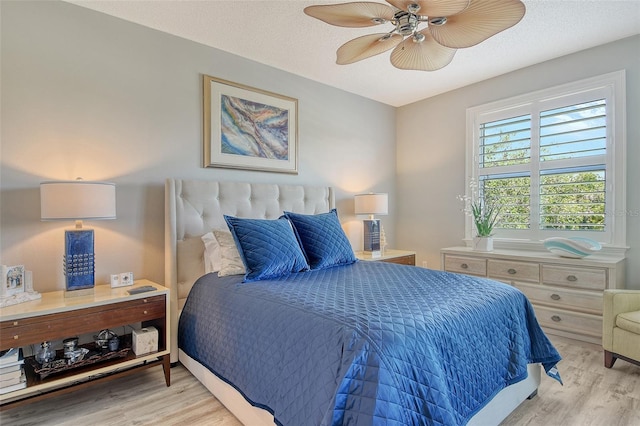 8735 Olde Hickory Ave Unit 8205, Sarasota, FL 34238 - bedroom with light wood-style flooring and a ceiling fan