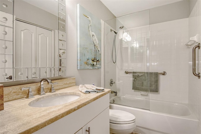 8735 Olde Hickory Ave Unit 8205, Sarasota, FL 34238 - bathroom featuring toilet, shower / bath combination with glass door, and vanity