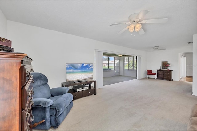 6701 12th Ave W, Bradenton, FL 34209 - living area featuring carpet flooring and ceiling fan