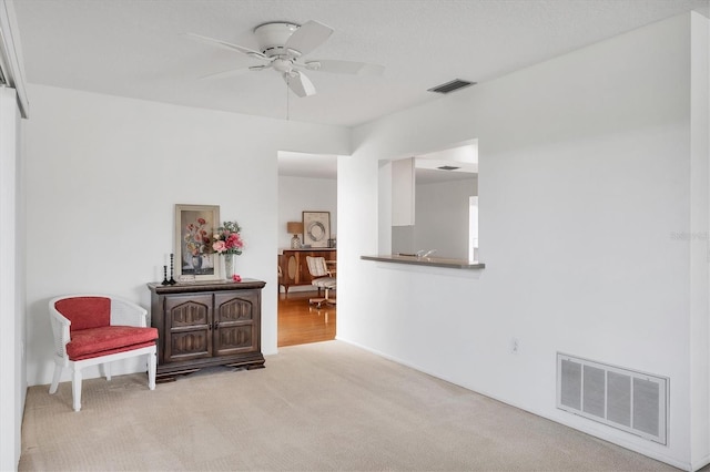 6701 12th Ave W, Bradenton, FL 34209 - sitting room featuring ceiling fan and light colored carpet