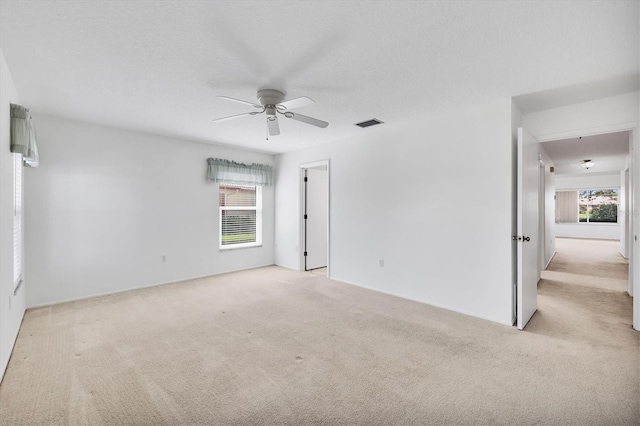 6701 12th Ave W, Bradenton, FL 34209 - carpeted empty room with ceiling fan and baseboards