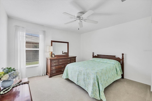 6701 12th Ave W, Bradenton, FL 34209 - bedroom featuring light carpet and a ceiling fan