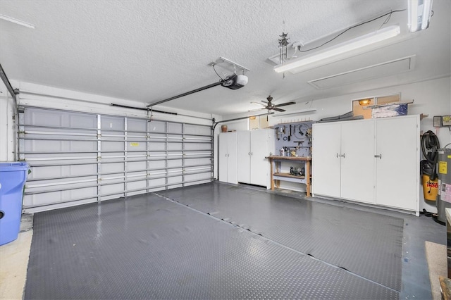 6701 12th Ave W, Bradenton, FL 34209 - garage with a garage door opener and ceiling fan