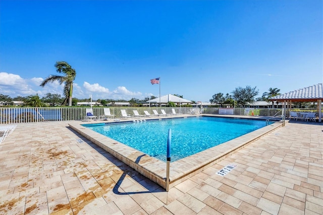 6701 12th Ave W, Bradenton, FL 34209 - community pool featuring a patio area