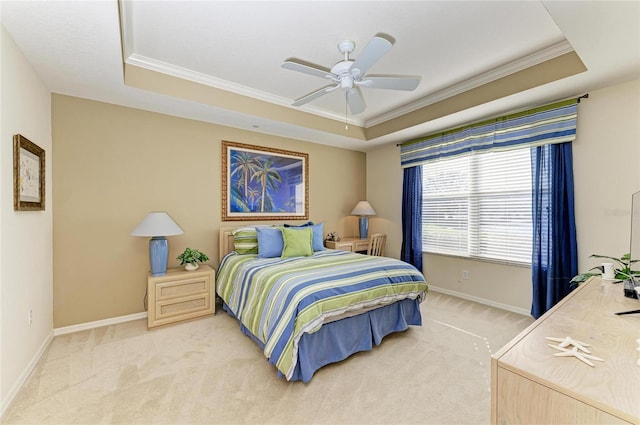 8422 Wethersfield Run Unit 103, Lakewood Ranch, FL 34202 - bedroom featuring crown molding, a tray ceiling, light carpet, baseboards, and ceiling fan