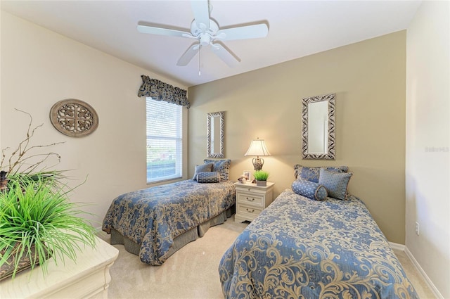 8422 Wethersfield Run Unit 103, Lakewood Ranch, FL 34202 - carpeted bedroom with a ceiling fan and baseboards