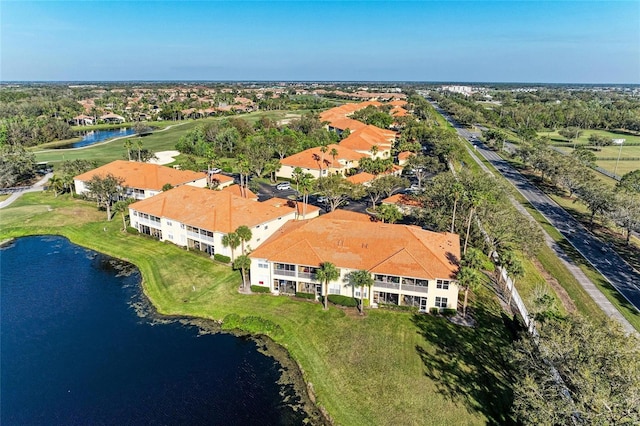 8422 Wethersfield Run Unit 103, Lakewood Ranch, FL 34202 - bird's eye view of a large body of water, a golf course, and a tree filled landscape