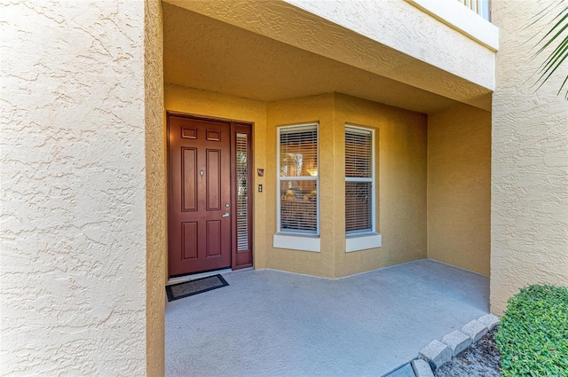 8422 Wethersfield Run Unit 103, Lakewood Ranch, FL 34202 - property entrance with stucco siding