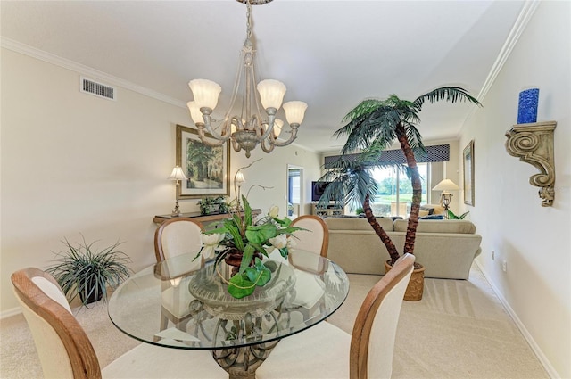 8422 Wethersfield Run Unit 103, Lakewood Ranch, FL 34202 - carpeted dining room featuring crown molding, a chandelier, and baseboards