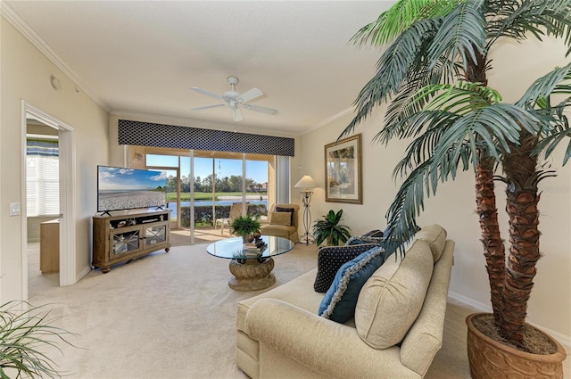 8422 Wethersfield Run Unit 103, Lakewood Ranch, FL 34202 - carpeted living area featuring ornamental molding, ceiling fan, and baseboards