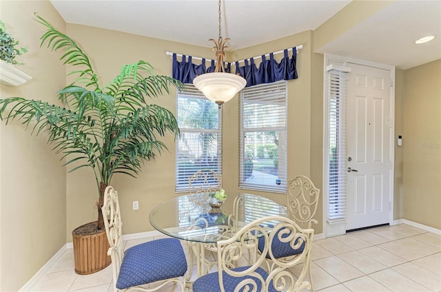 8422 Wethersfield Run Unit 103, Lakewood Ranch, FL 34202 - tiled dining room with baseboards