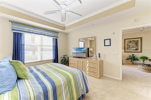 8422 Wethersfield Run Unit 103, Lakewood Ranch, FL 34202 - bedroom with ornamental molding, light carpet, baseboards, and ceiling fan