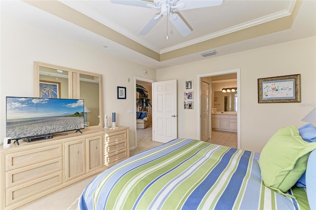 8422 Wethersfield Run Unit 103, Lakewood Ranch, FL 34202 - bedroom featuring crown molding, a raised ceiling, ensuite bathroom, and ceiling fan