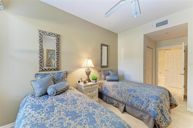 8422 Wethersfield Run Unit 103, Lakewood Ranch, FL 34202 - bedroom with carpet floors, baseboards, a ceiling fan, and connected bathroom