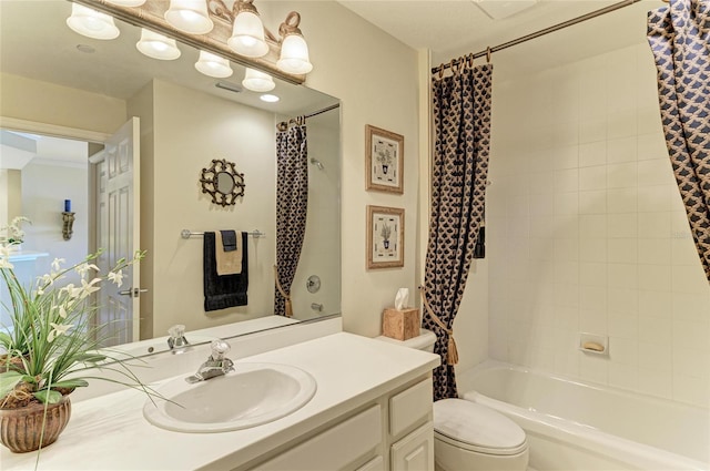 8422 Wethersfield Run Unit 103, Lakewood Ranch, FL 34202 - bathroom featuring vanity, shower / bath combination with curtain, and toilet