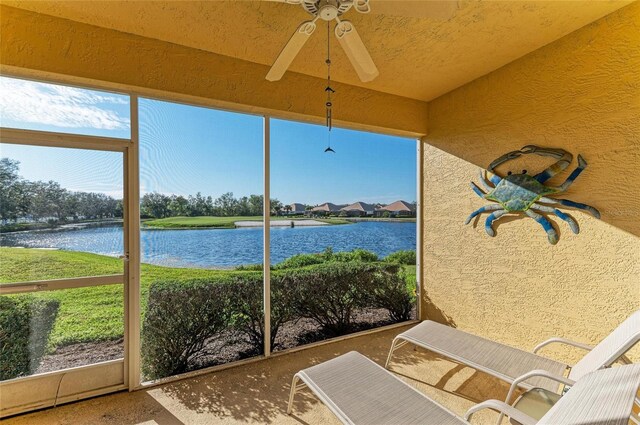 8422 Wethersfield Run Unit 103, Lakewood Ranch, FL 34202 - unfurnished sunroom with a ceiling fan and a water view