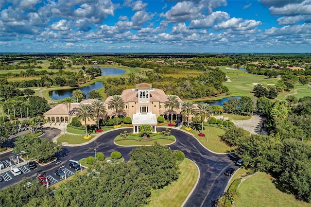 8422 Wethersfield Run Unit 103, Lakewood Ranch, FL 34202 - aerial view of a nearby body of water, a golf club, and a tree filled landscape