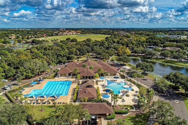 8422 Wethersfield Run Unit 103, Lakewood Ranch, FL 34202 - bird's eye view of a pool and a nearby body of water