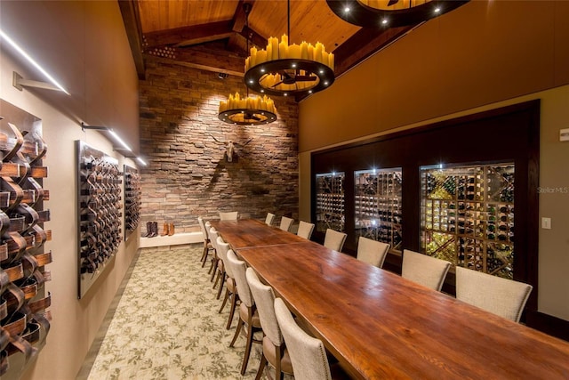 8422 Wethersfield Run Unit 103, Lakewood Ranch, FL 34202 - wine cellar with wood ceiling with exposed beams, high vaulted ceiling, and a chandelier