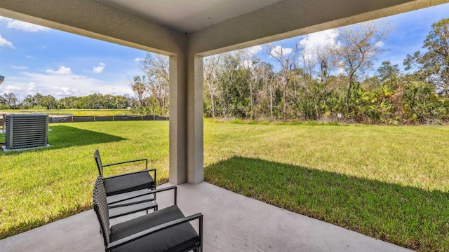 4423 Dusky Dawn Ln, Palmetto, FL 34221 - view of yard featuring cooling unit, a patio, and view of scattered trees