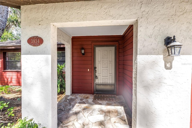 3934 Brookside Dr, Sarasota, FL 34231 - property entrance featuring stucco siding