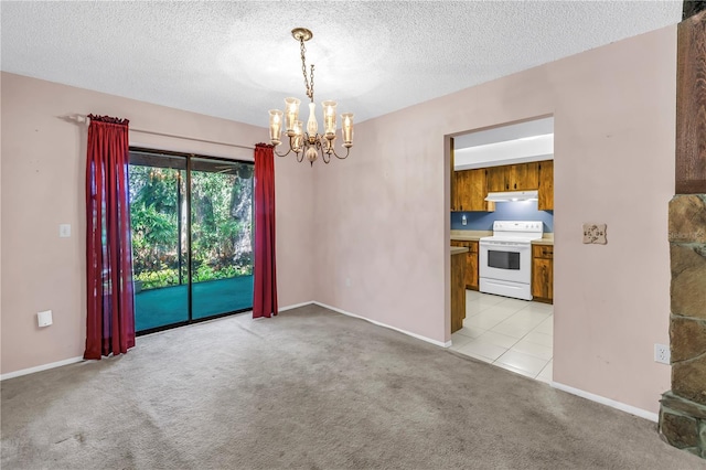 3934 Brookside Dr, Sarasota, FL 34231 - unfurnished room featuring a chandelier, light carpet, a textured ceiling, baseboards, and light tile patterned flooring