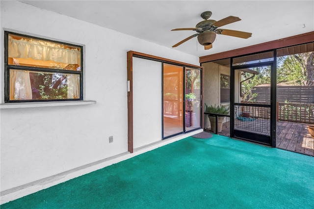 3934 Brookside Dr, Sarasota, FL 34231 - unfurnished sunroom with a ceiling fan