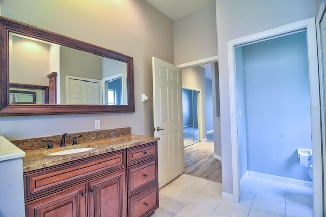 2809 112th Ter E, Parrish, FL 34219 - bathroom with vanity, tile patterned floors, baseboards, and toilet