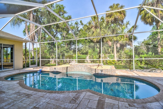 2809 112th Ter E, Parrish, FL 34219 - swimming pool featuring a hot tub, a patio, and a lanai