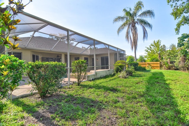 2809 112th Ter E, Parrish, FL 34219 - view of yard with a ceiling fan and glass enclosure