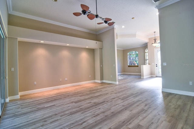 2809 112th Ter E, Parrish, FL 34219 - empty room featuring ornamental molding, a ceiling fan, wood finished floors, baseboards, and recessed lighting