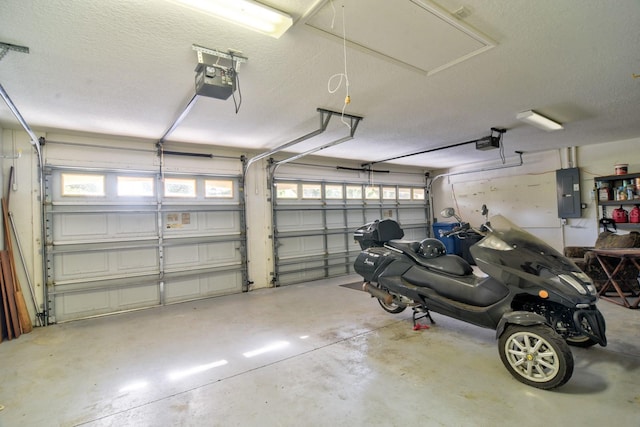 2809 112th Ter E, Parrish, FL 34219 - garage featuring electric panel and a garage door opener